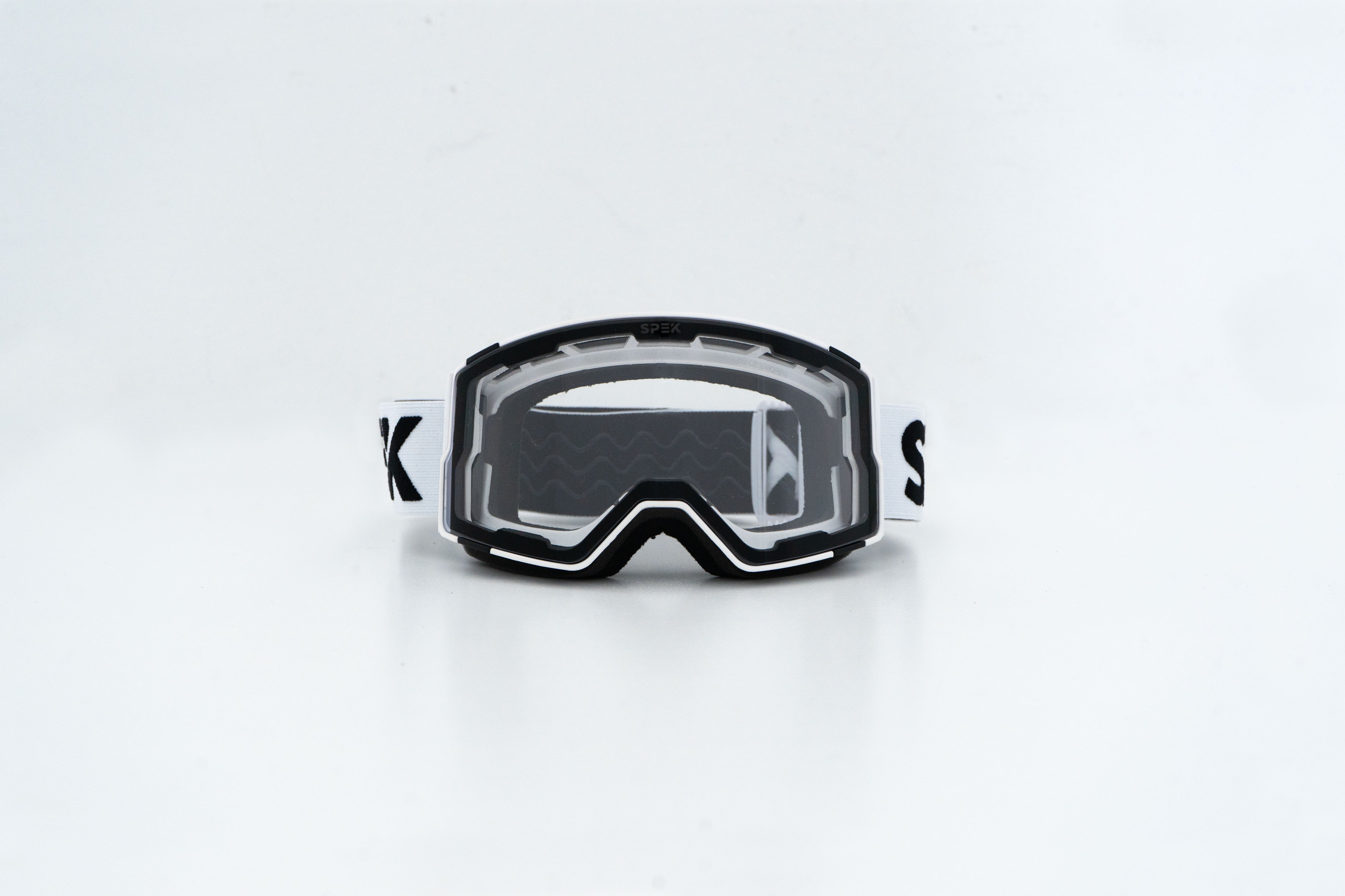 lunette de ski avec cadre blanc lentille transparente